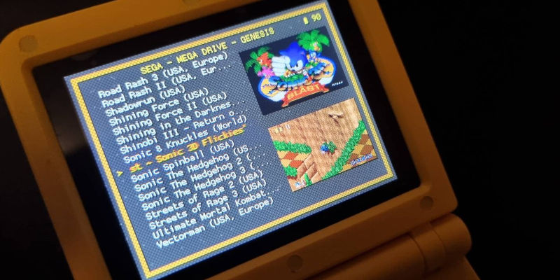 Powkiddy V90 display showing RetroArch with Sonic Blast highlighted and screenshot thumbnails to the side.